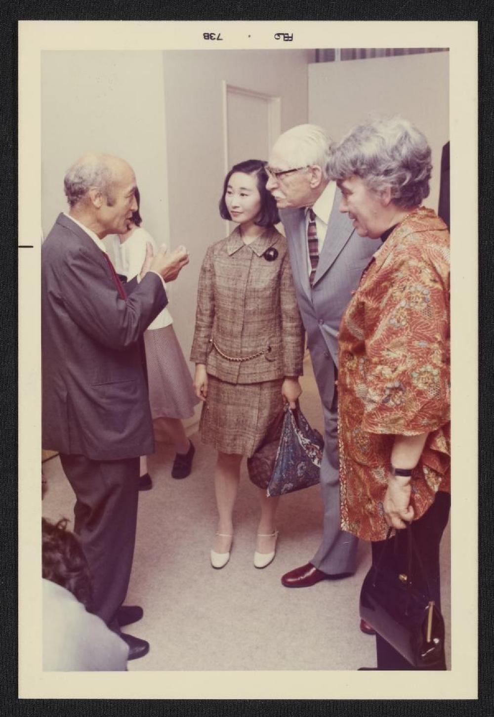 Noguchi with Noguchi with Bernard Leach, Janet Leach, Mihoko Okamura and guests at exhibition opening, Minami Gallery, 1973